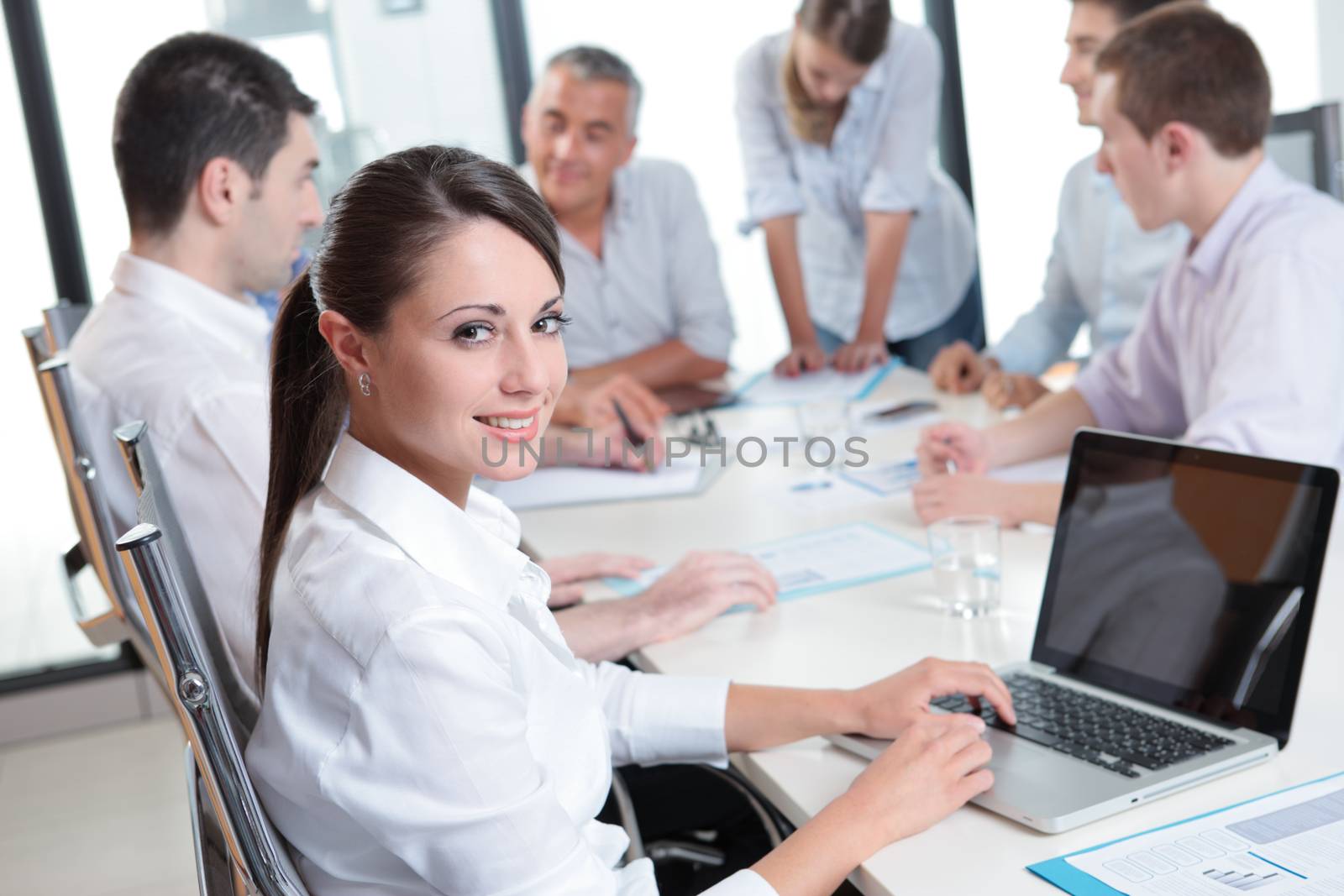 Portrait of a pretty businesswoman smiling during a meeting