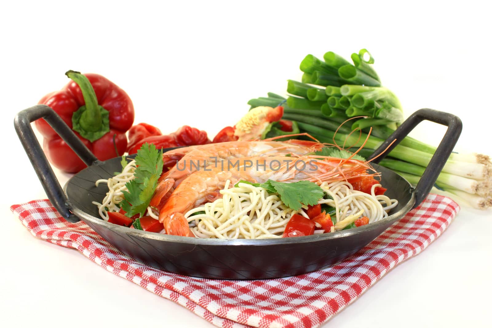 Black tiger prawns on Mie noodles with vegetables