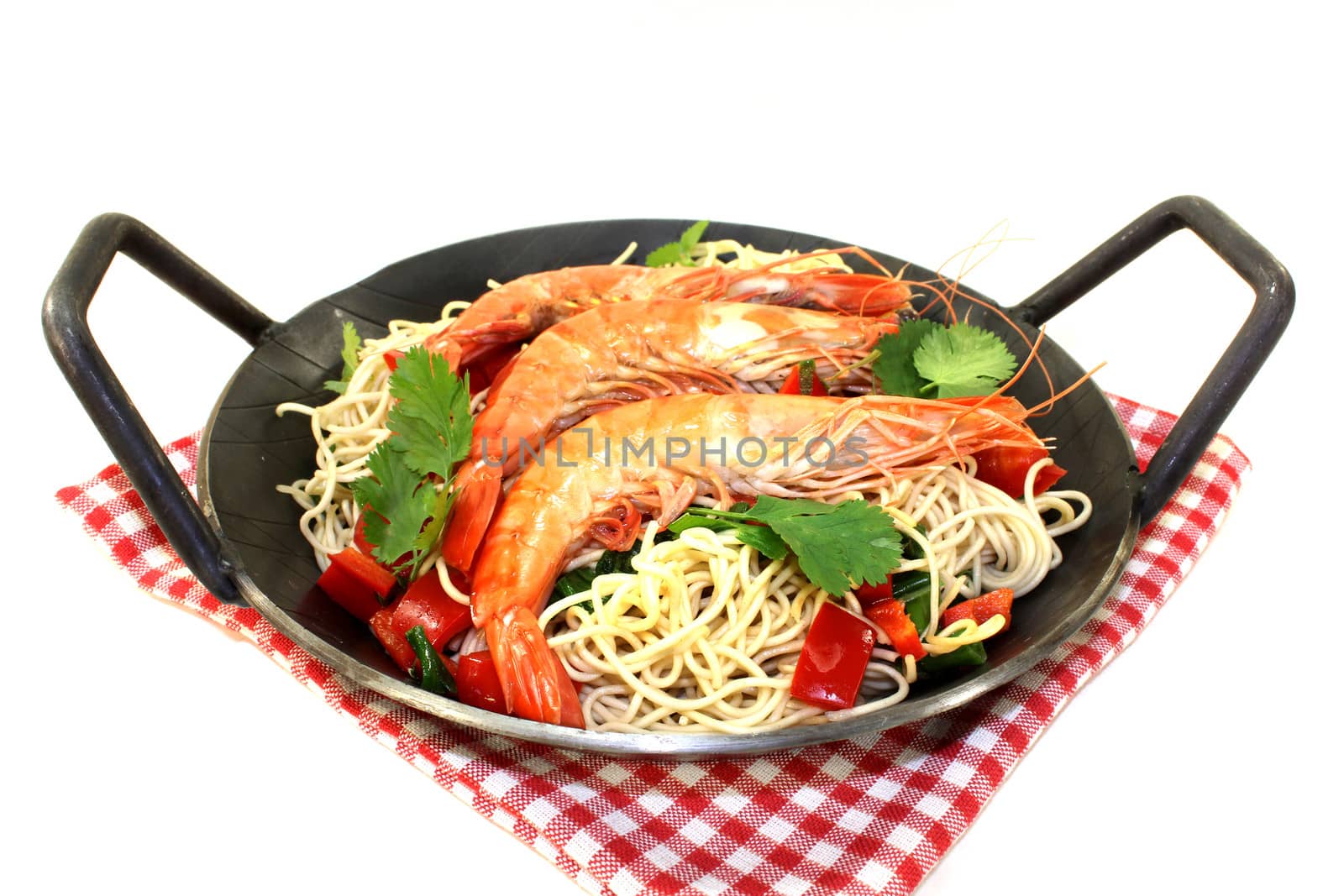 Black tiger prawns on Mie noodles with vegetables