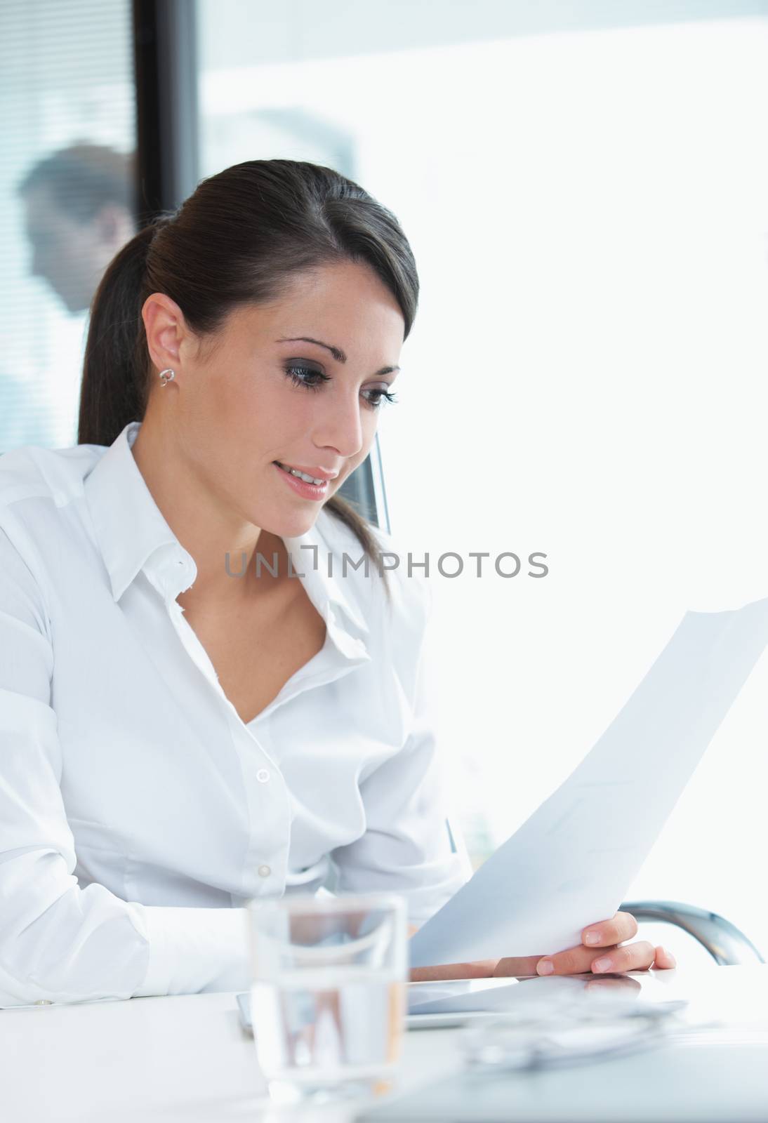 Portrait of a young executive woman in her office