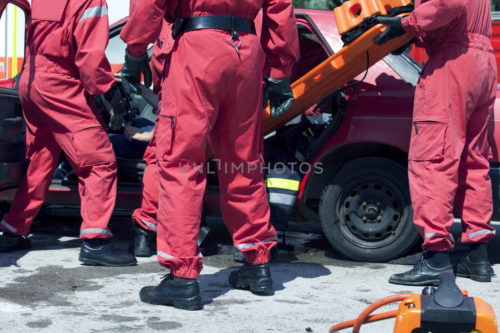 Rescue operation after a car crash by wellphoto