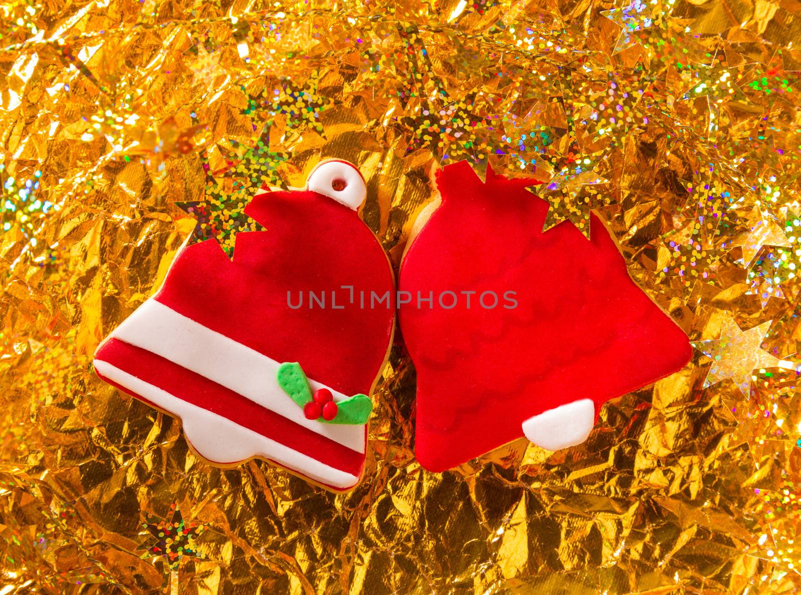 Christmas cookies Xmas red bell shape on golden background