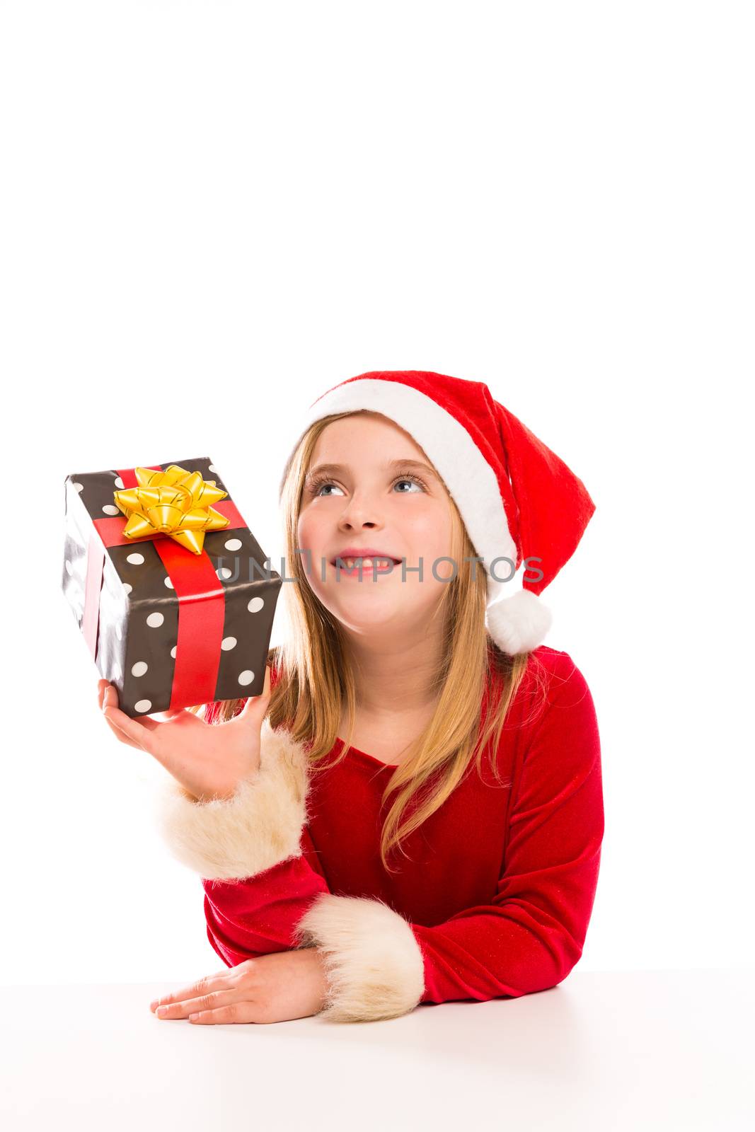 Christmas Santa blond kid girl happy excited with ribbon gift isolated on white background