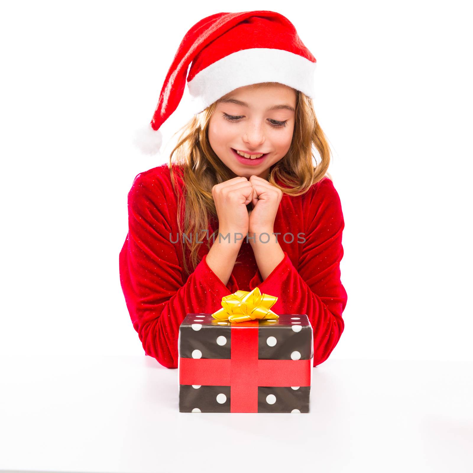 Christmas Santa kid girl happy excited with ribbon gift isolated on white background