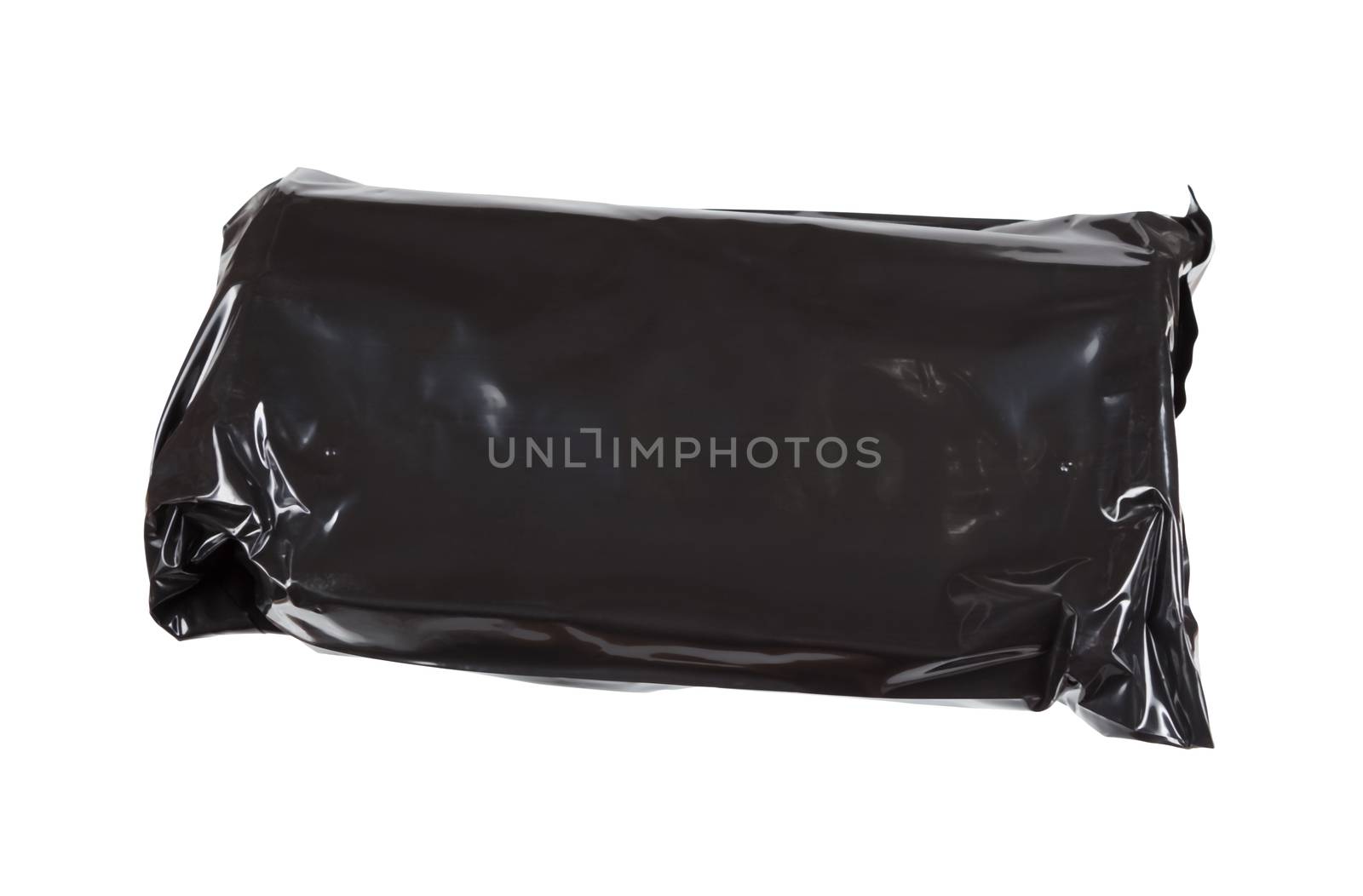 black cellophane packet with unknown contents isolated on white background