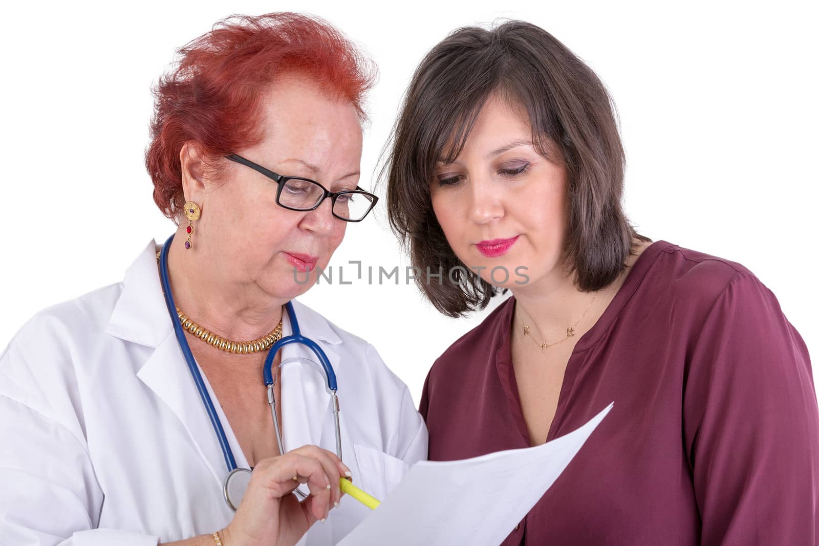 Female Doctor and her female patient discussing exam results, might be the payment options