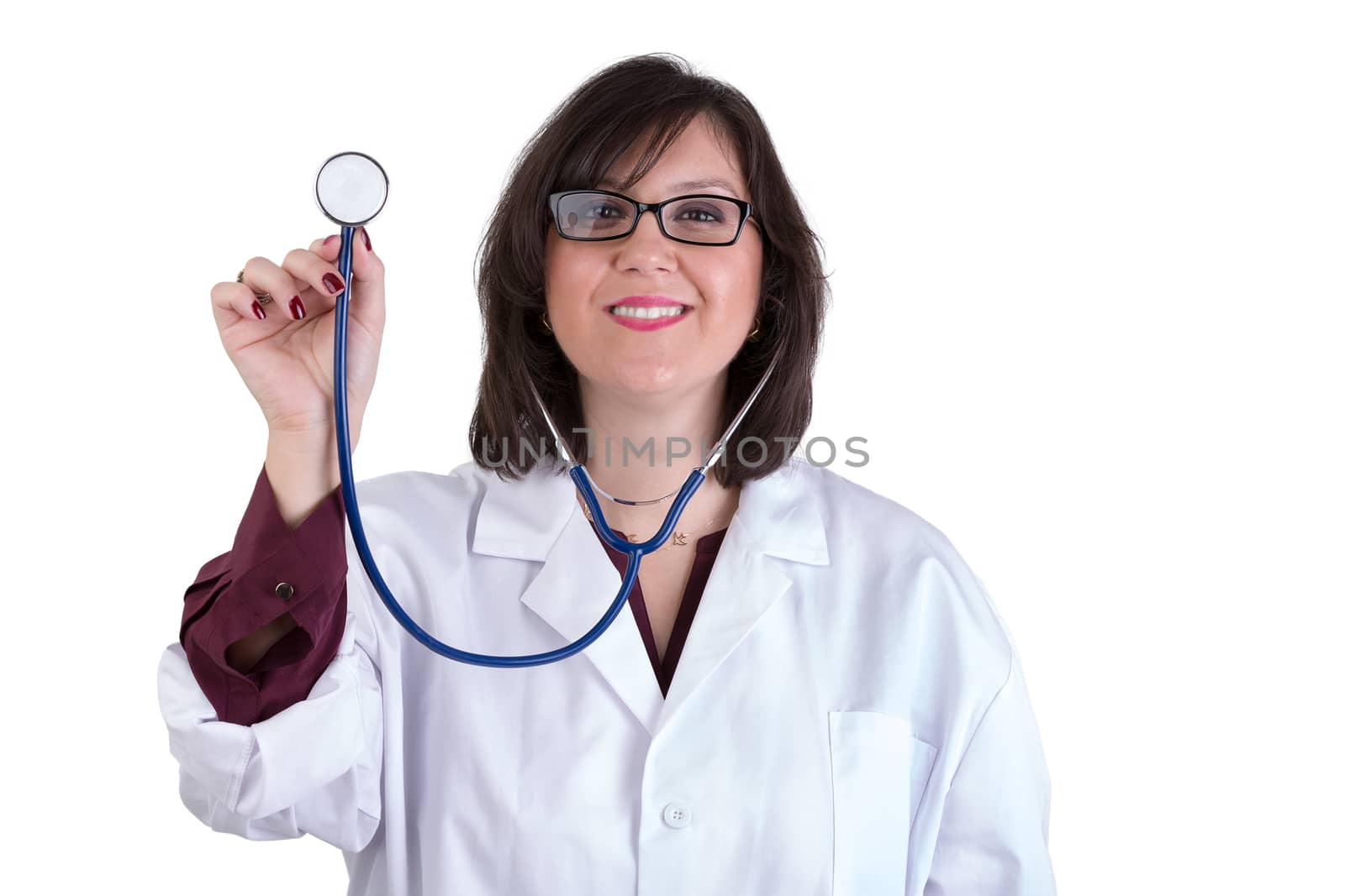 Sympathetic healthcare Intern looking at you genuinely and friendly while holding her stethoscope high