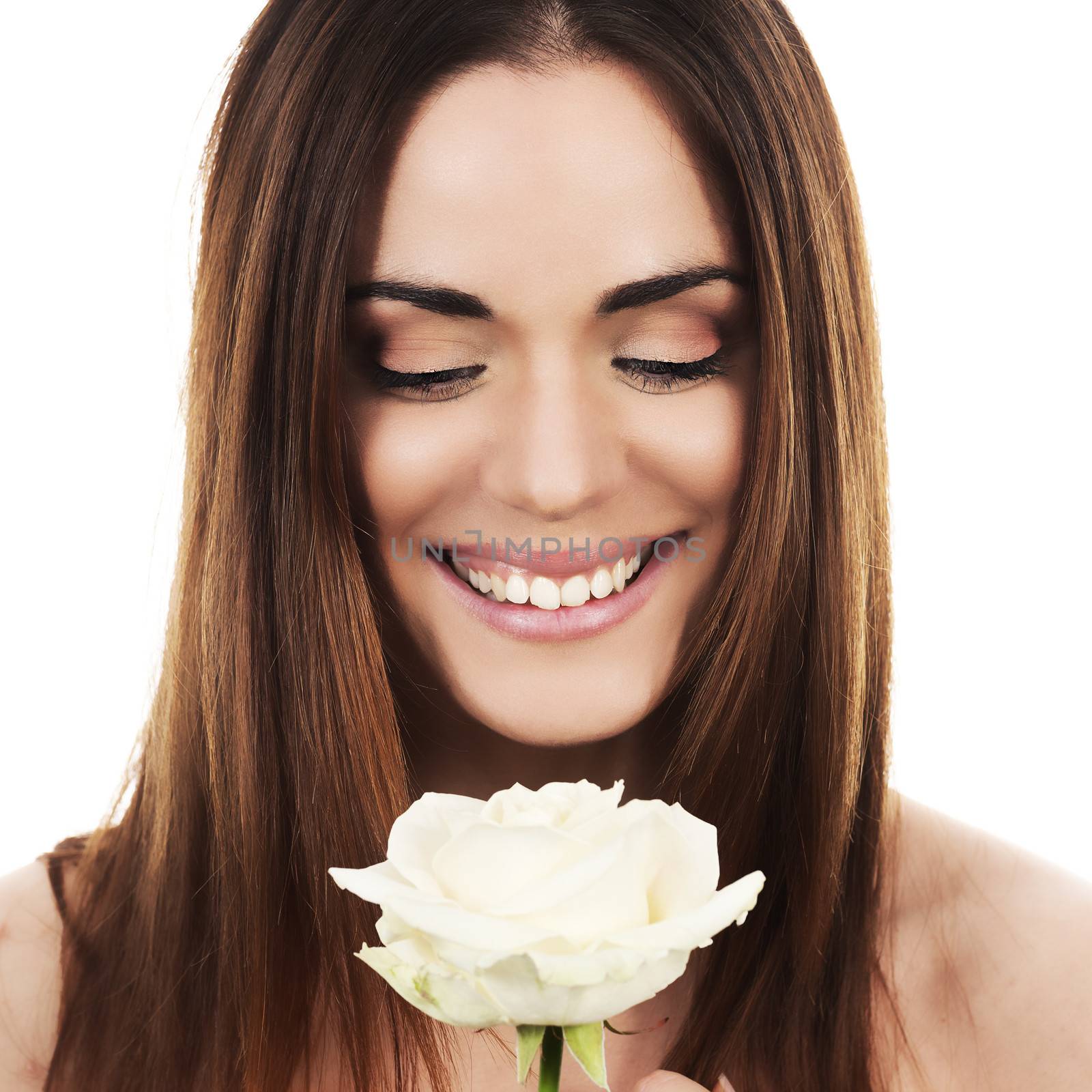 Portrait of cute woman with white rose 