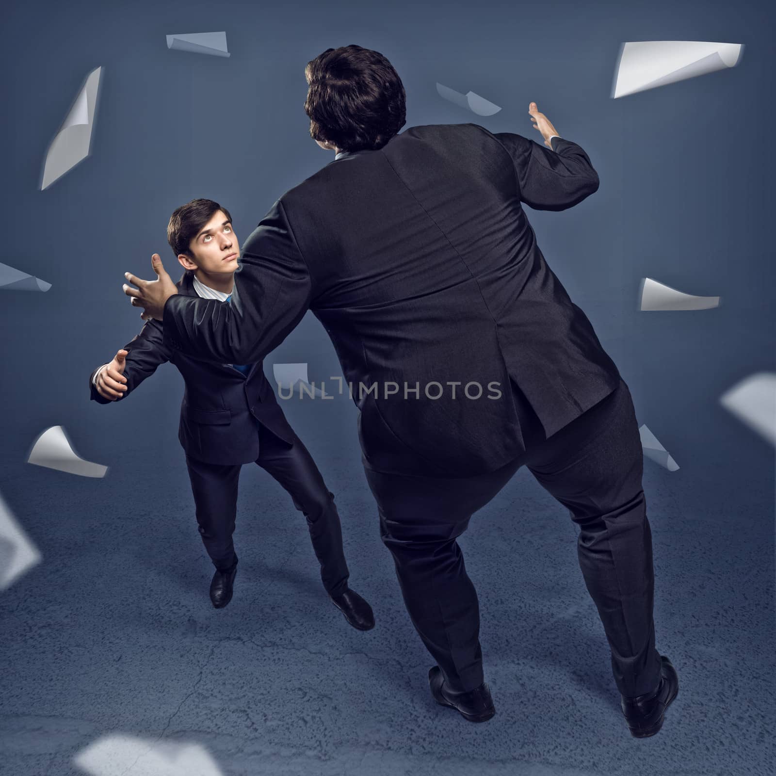 two businessmen fighting as sumoists, the concept of competition in business