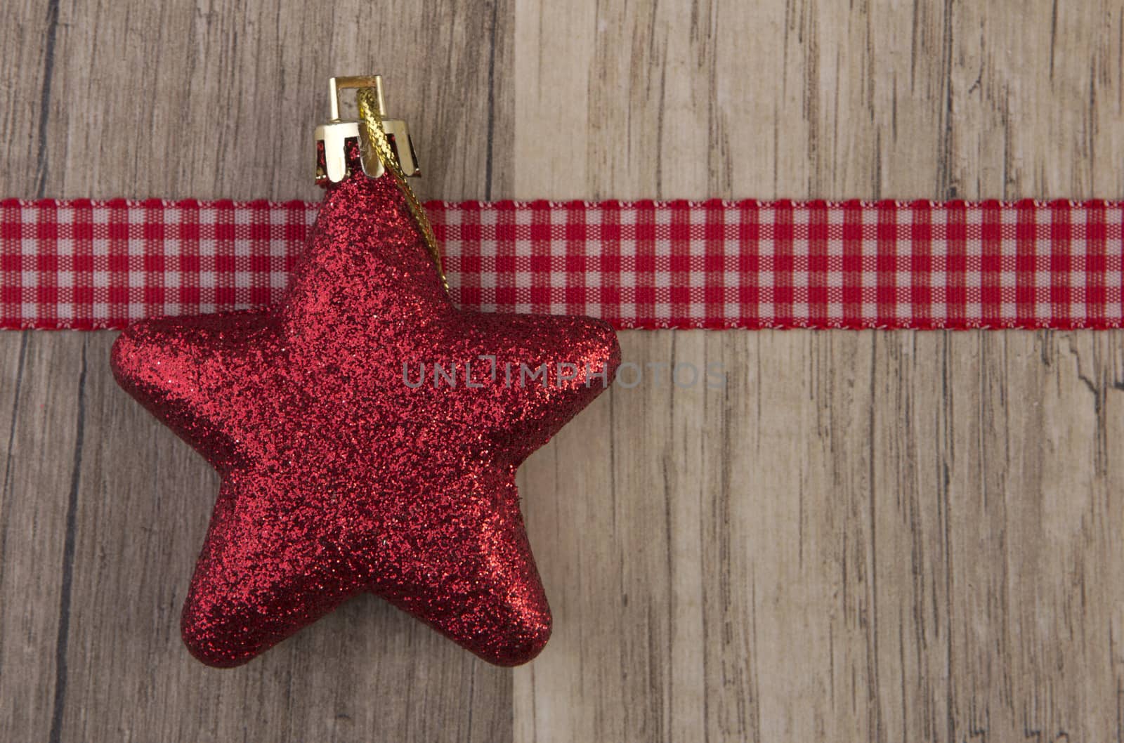 christmas decoration with christmas baubles red on wooden background 