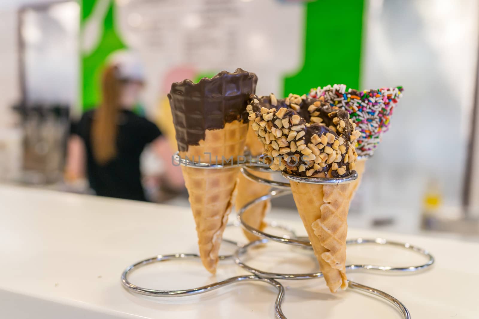 Ice cream cones in store by IVYPHOTOS