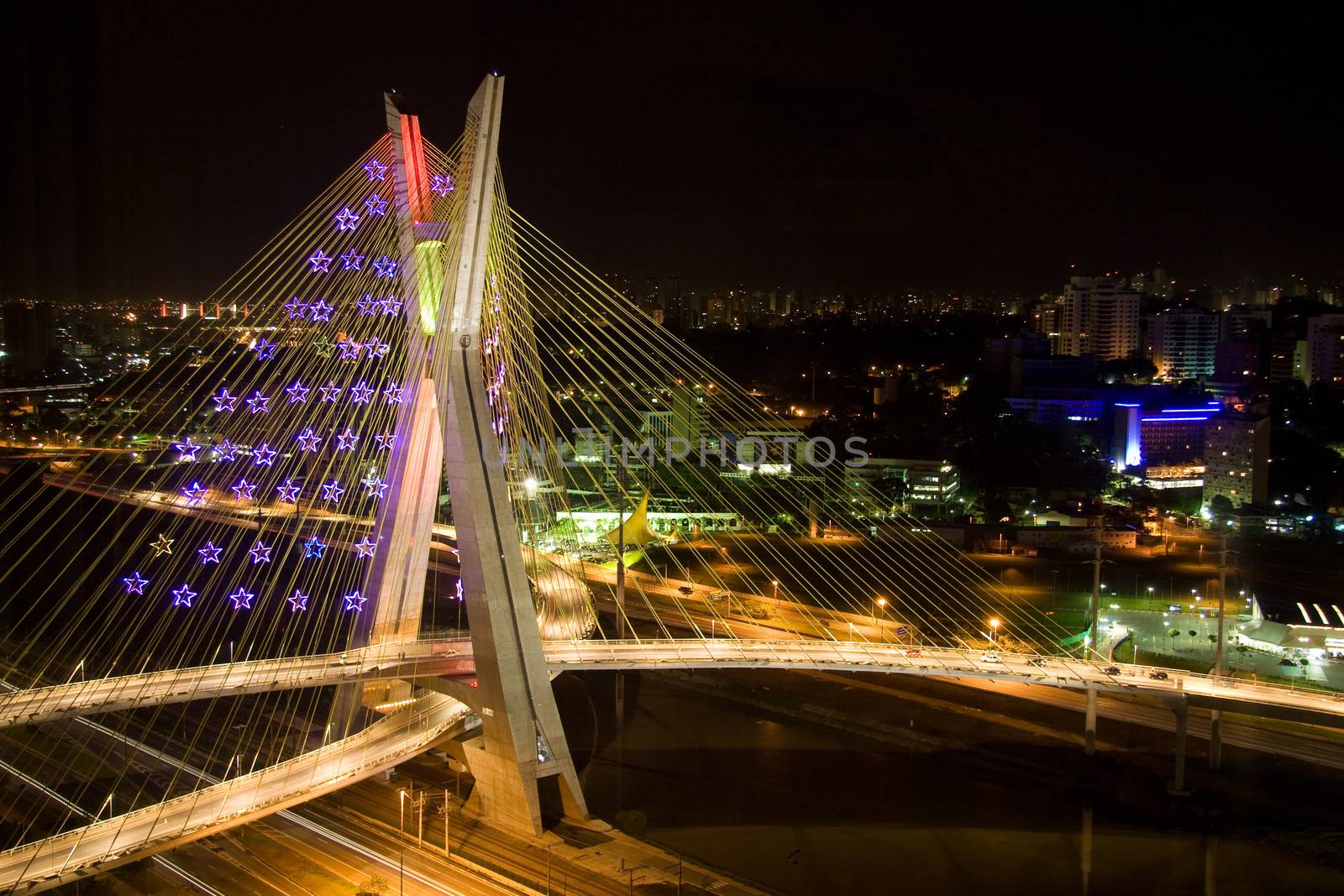 Awesome bridge lit up at night by CelsoDiniz