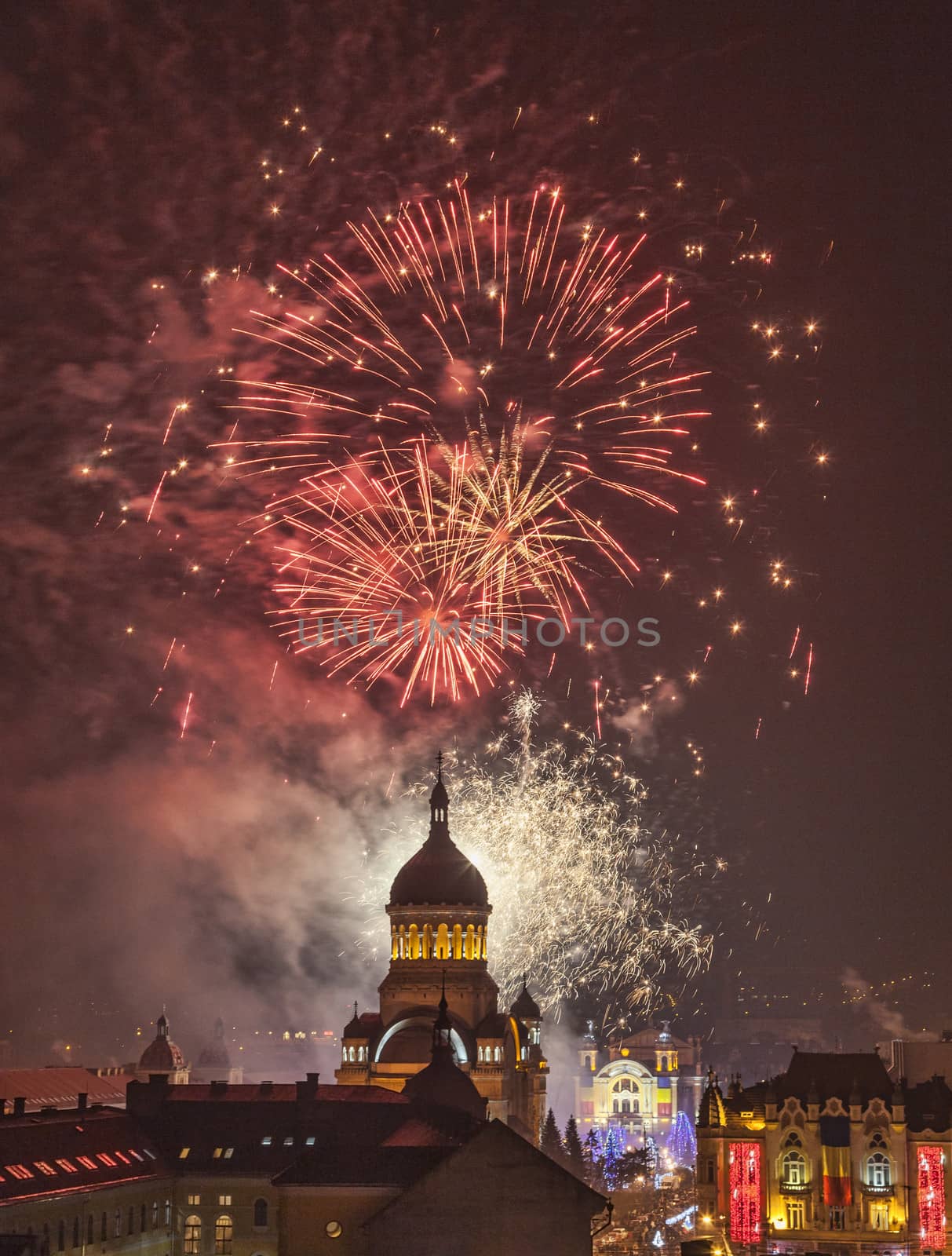 Cluj Napoca,Romania- December 1st,2013: Beautiful fireworks show takes place in Avram Iancu Square in Cluj Napoca with the ocassion of The Romanian National day on 1 December 2013 in Cluj Napoca, Romania.