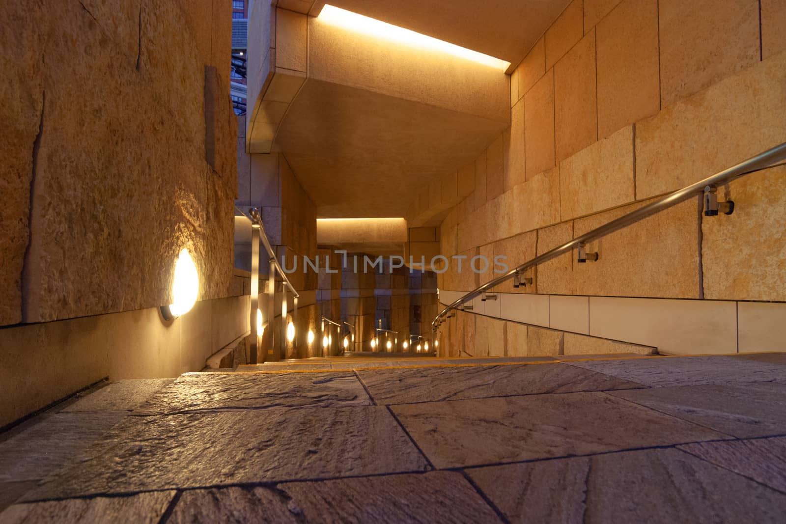 modern stone tile stairs illuminated by evening