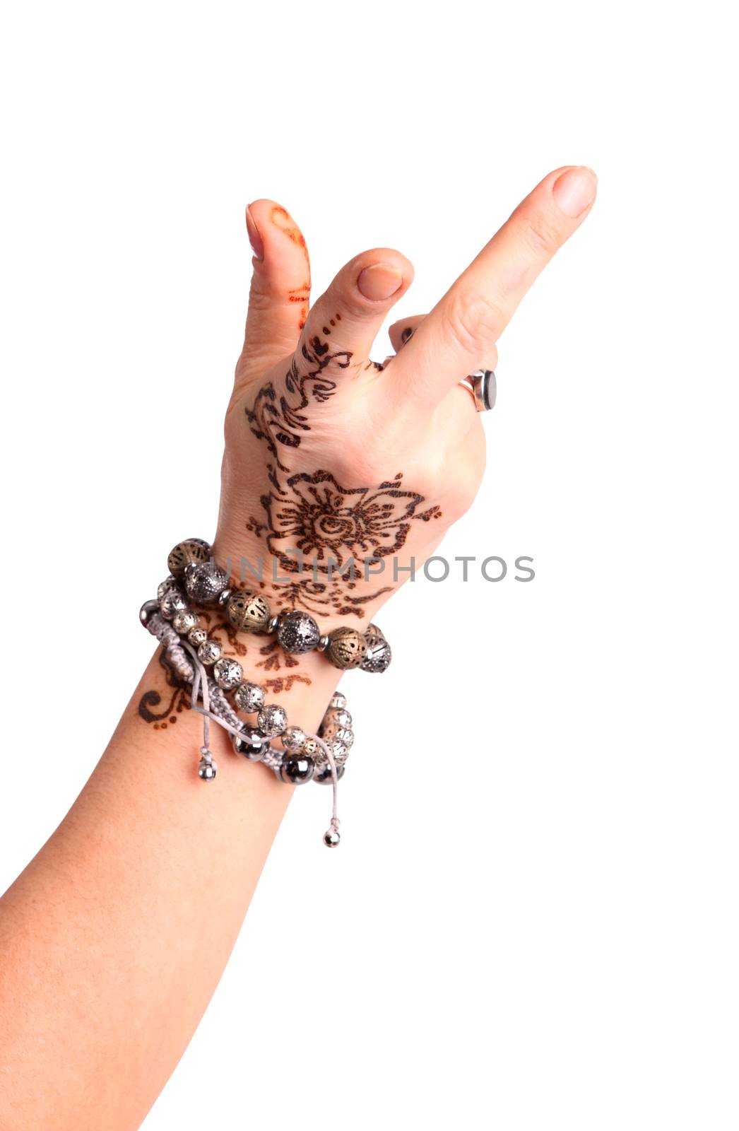 Female hand gesture of oriental dance. Female hand with henna painted on the white background
