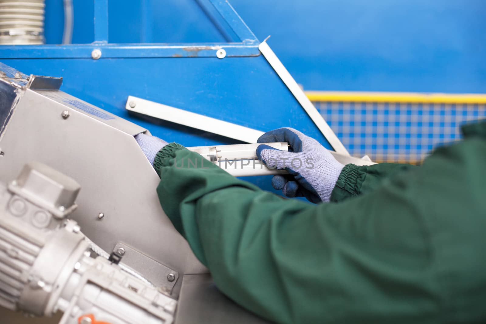 Man in white gloves recycled fluorescent lamp