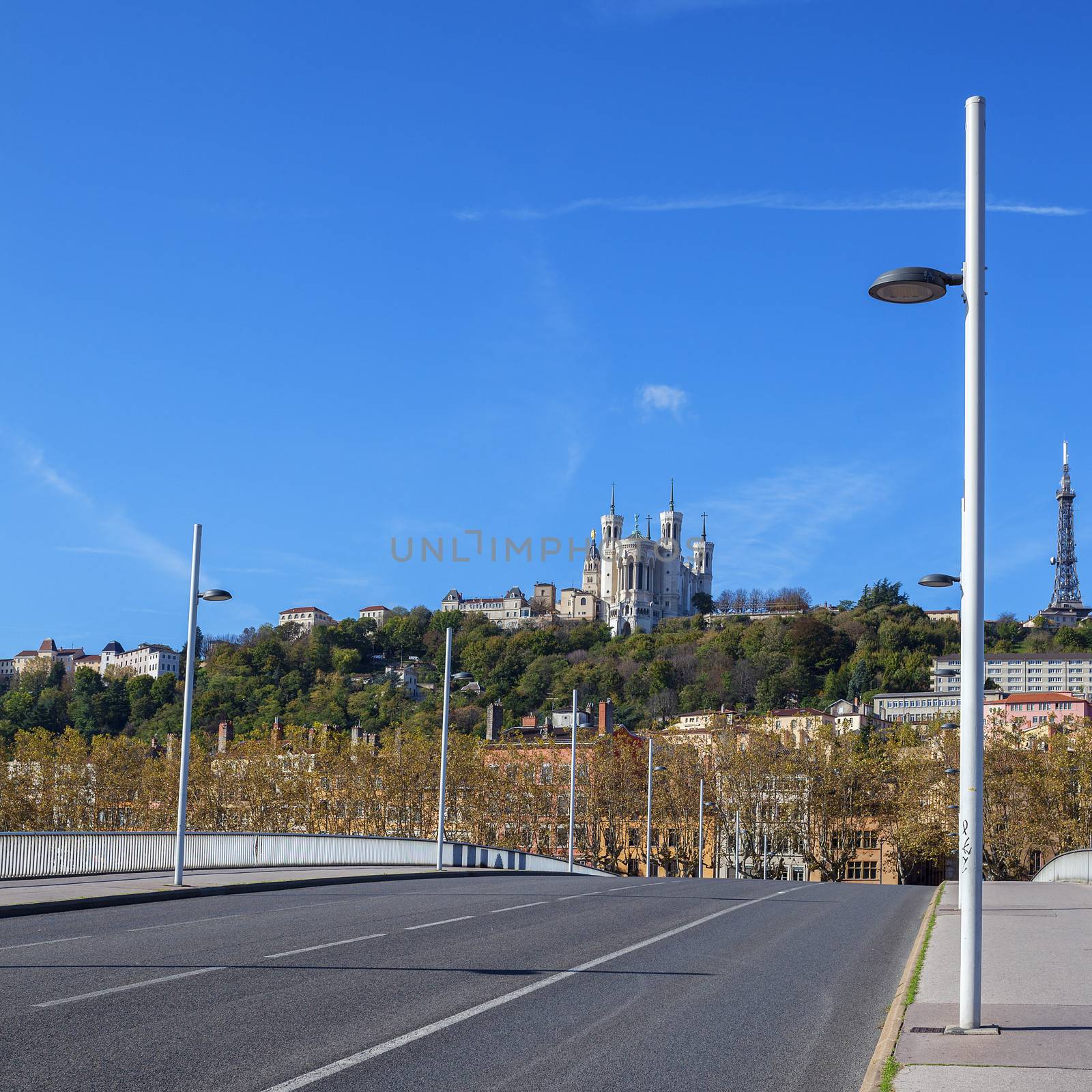 view of Lyon with basilica and bridge