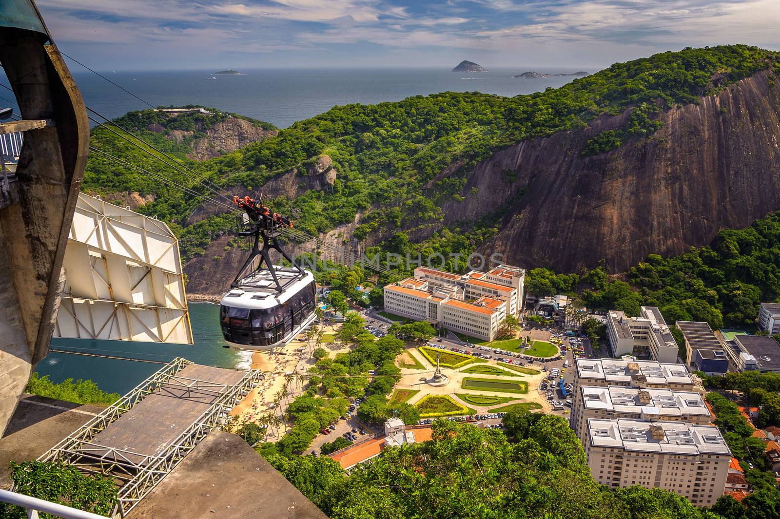 Cable car moving over a residential area, Urca, Rio de Janeiro, Brazil