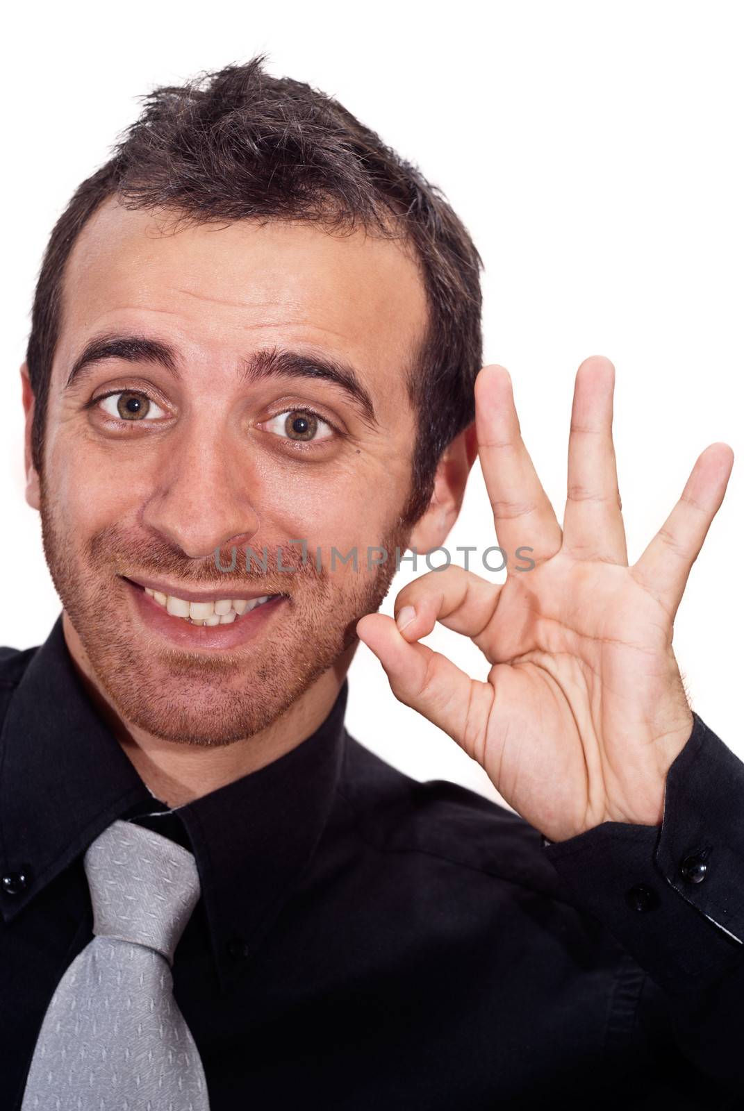 Young businessman makes OK sign isolated on white background