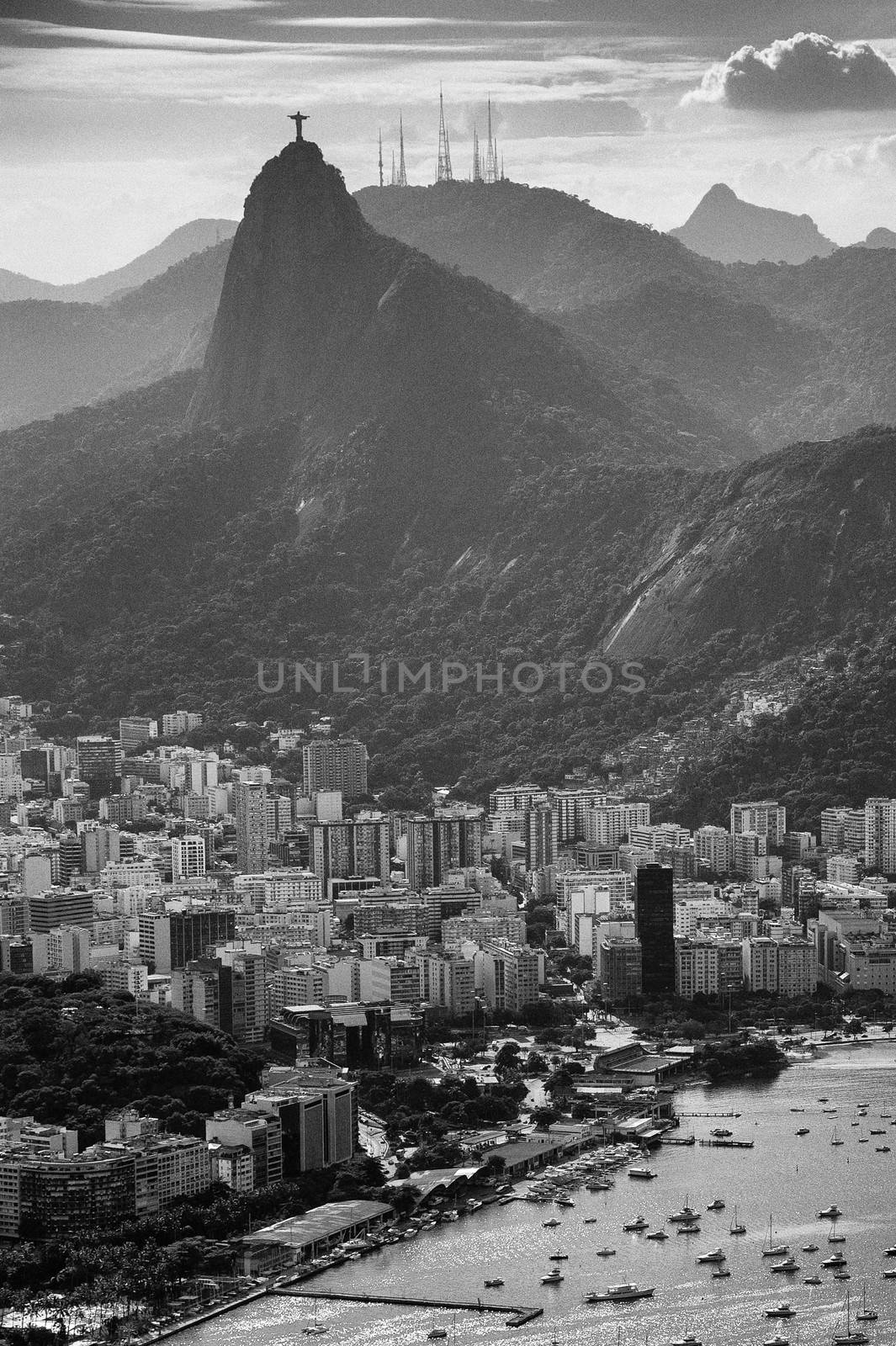 Cityscape with the Christ The Redeemer statue in the background, Corcovado, Rio de Janeiro, Brazil