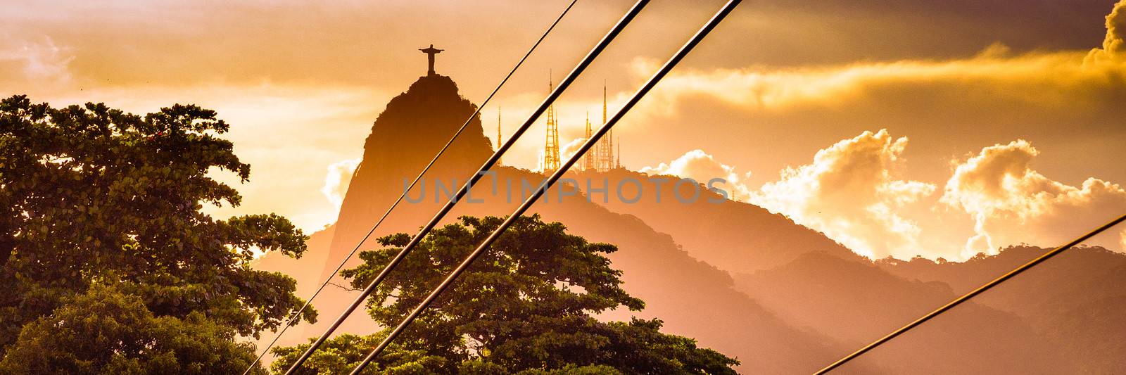 Metal cables with the Christ The Redeemer statue in the background, Corcovado, Rio de Janeiro, Brazil