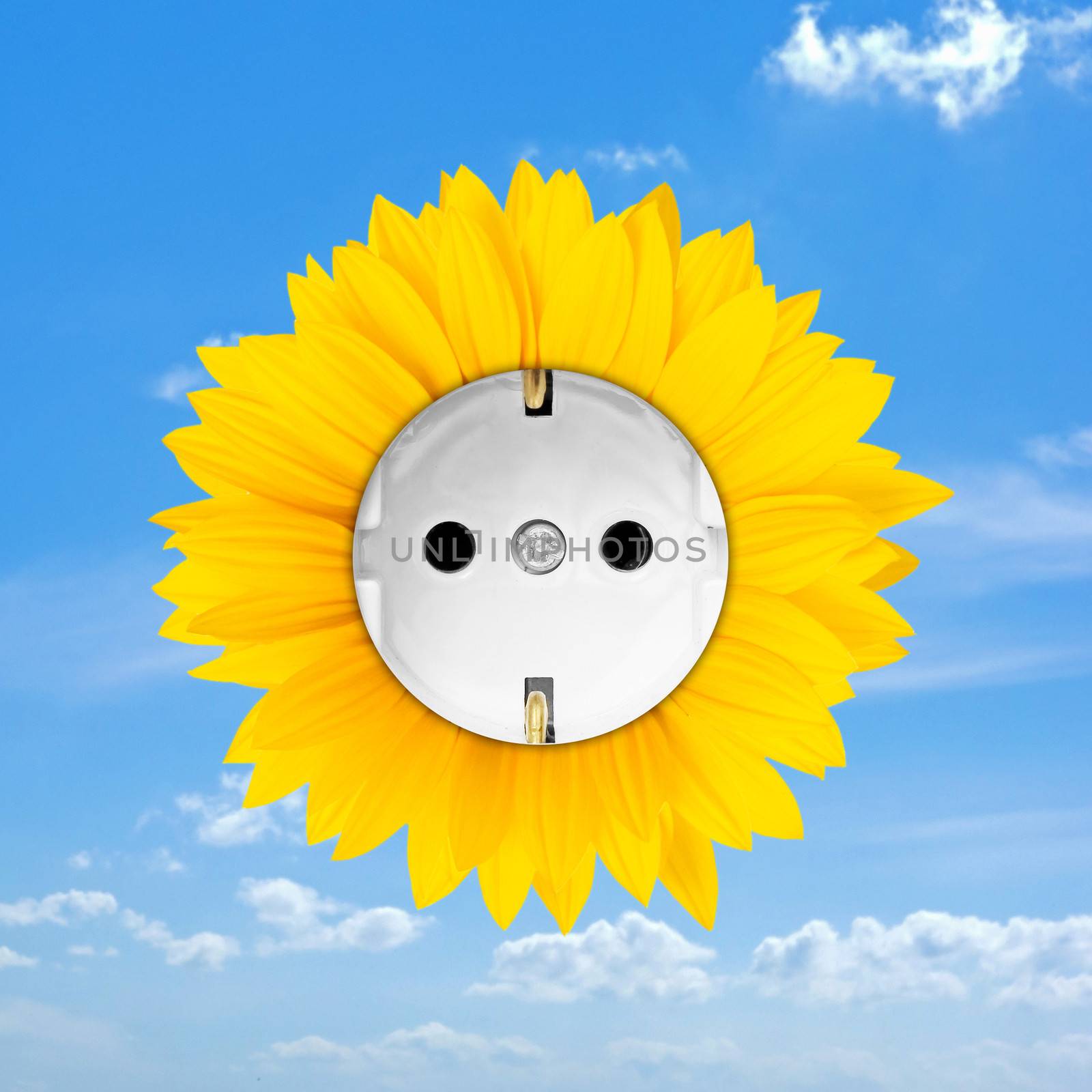 Sunflower combined with a convenience outlet on blue cloudy sky symbolizing sun energy