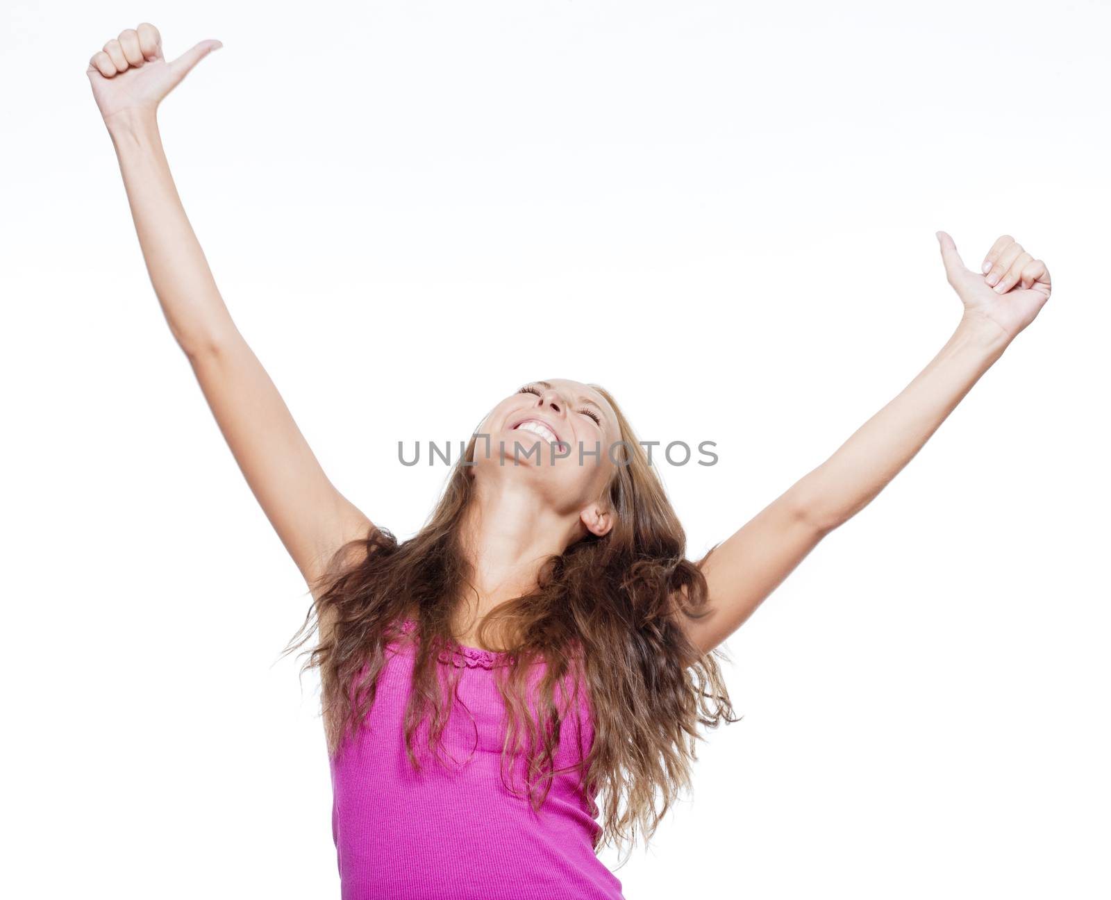 excited young girl showing both thumbs up screming - isolated on white