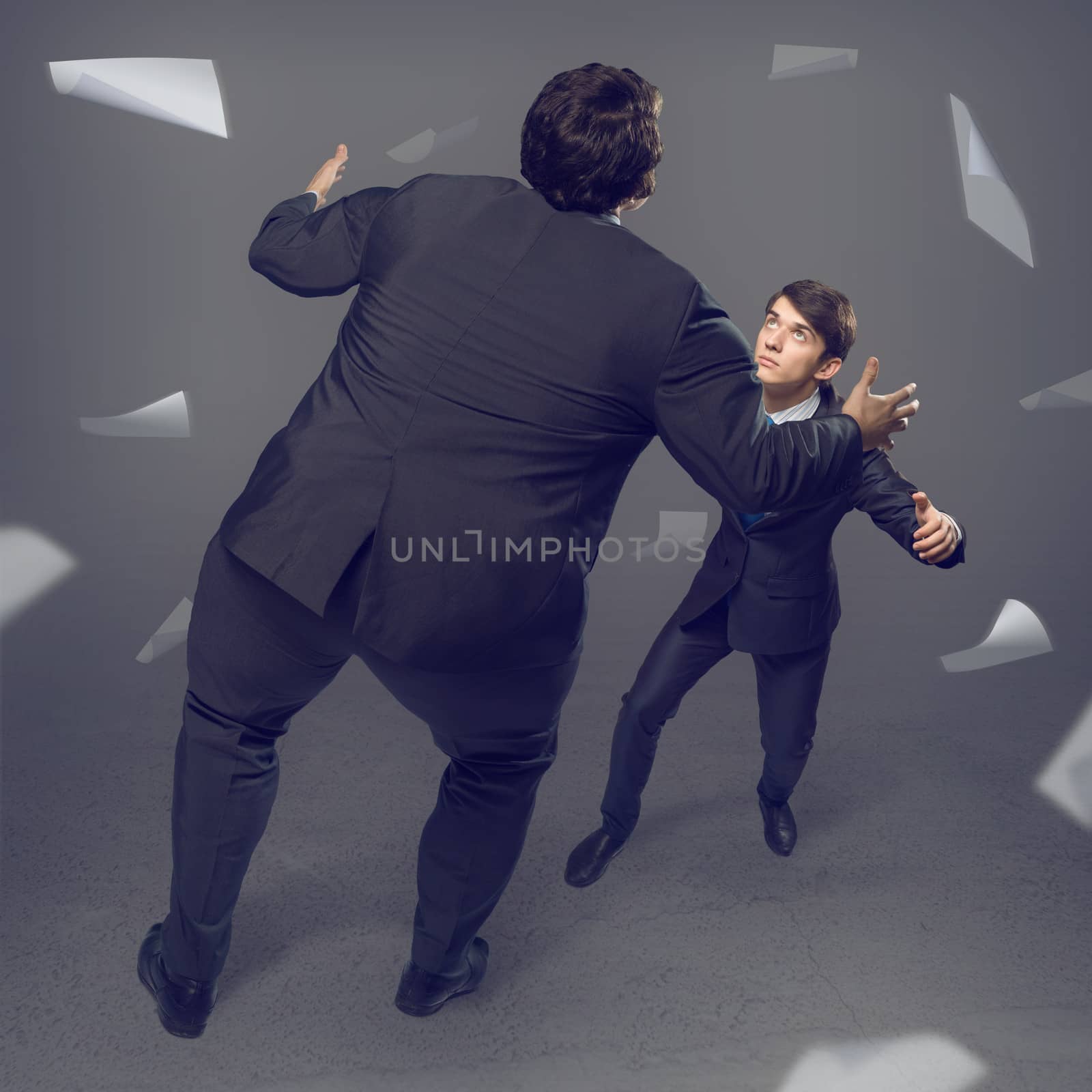 two businessmen fighting as sumoists, the concept of competition in business