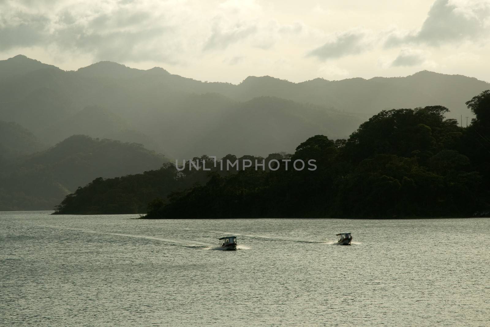 Boats on the lake near the Arenal Volcano in Costa Rica.