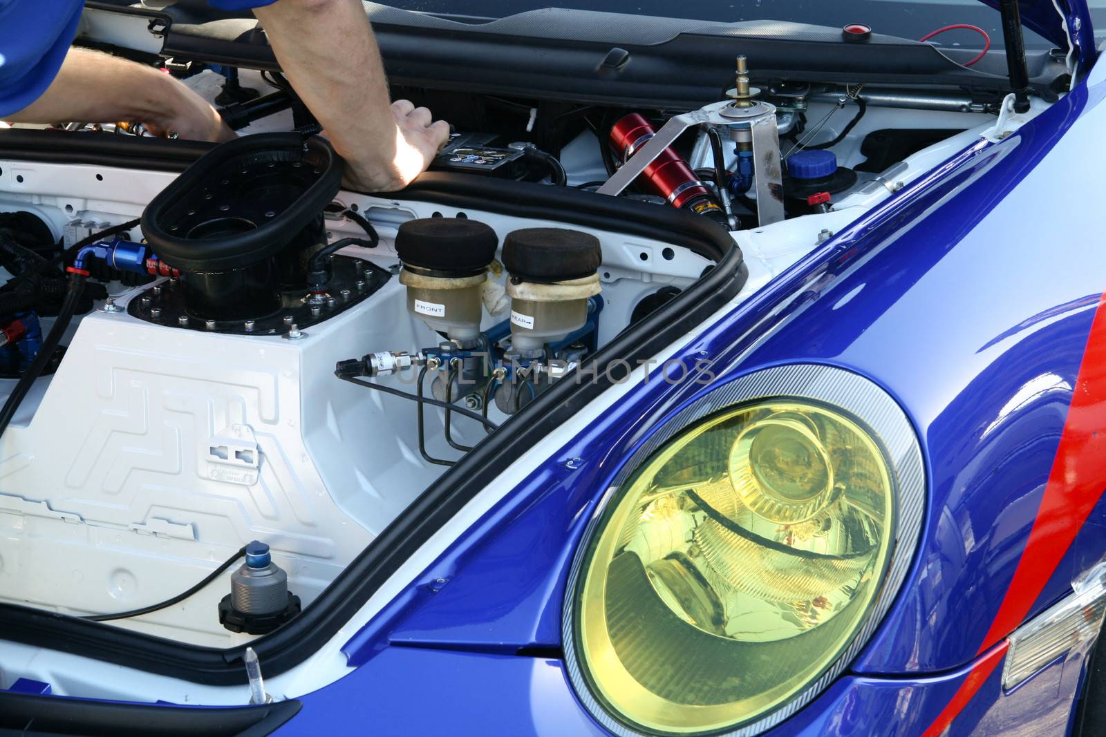 Mechanic repairing a racecar engine, Homestead, Miami, Miami-Dade County, Florida, USA