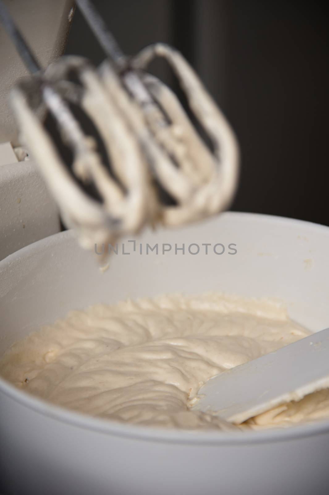 Detail of a mixer with cream on it