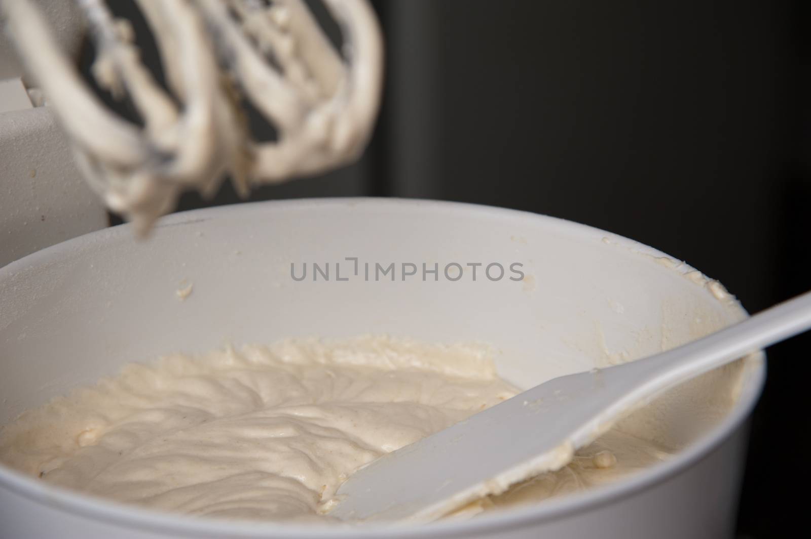 Detail of a mixer with cream on it