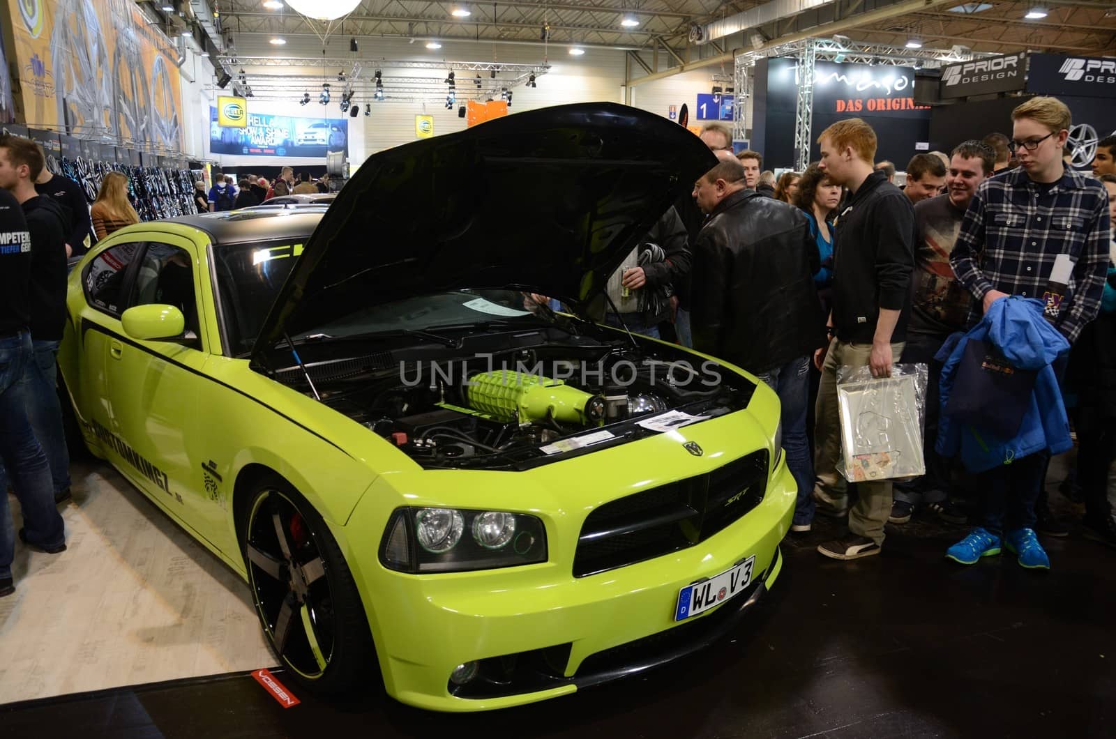 ESSEN, GERMANY - November 30: Customkingz shows their upgraded car and engine during Essen Motor Show in Germany, on November 30, 2013.