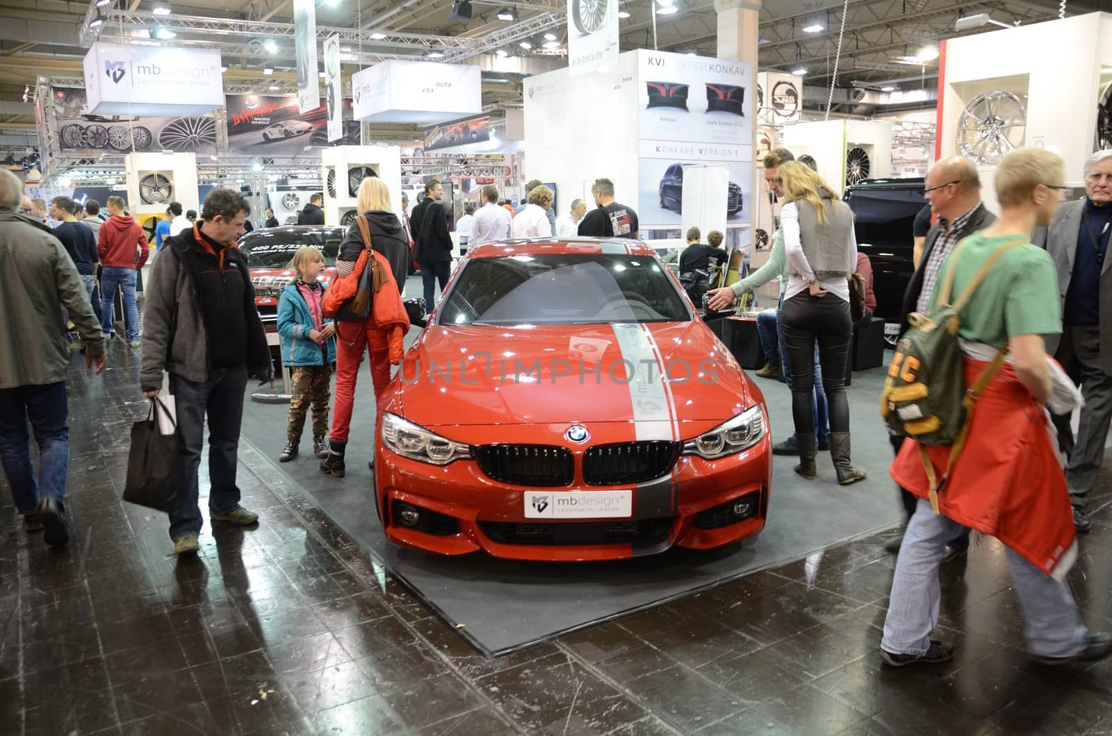 ESSEN, GERMANY - November 30: Visitors admire BMW tunning by Mbdesign during Essen Motor Show in Germany, on November 30, 2013.