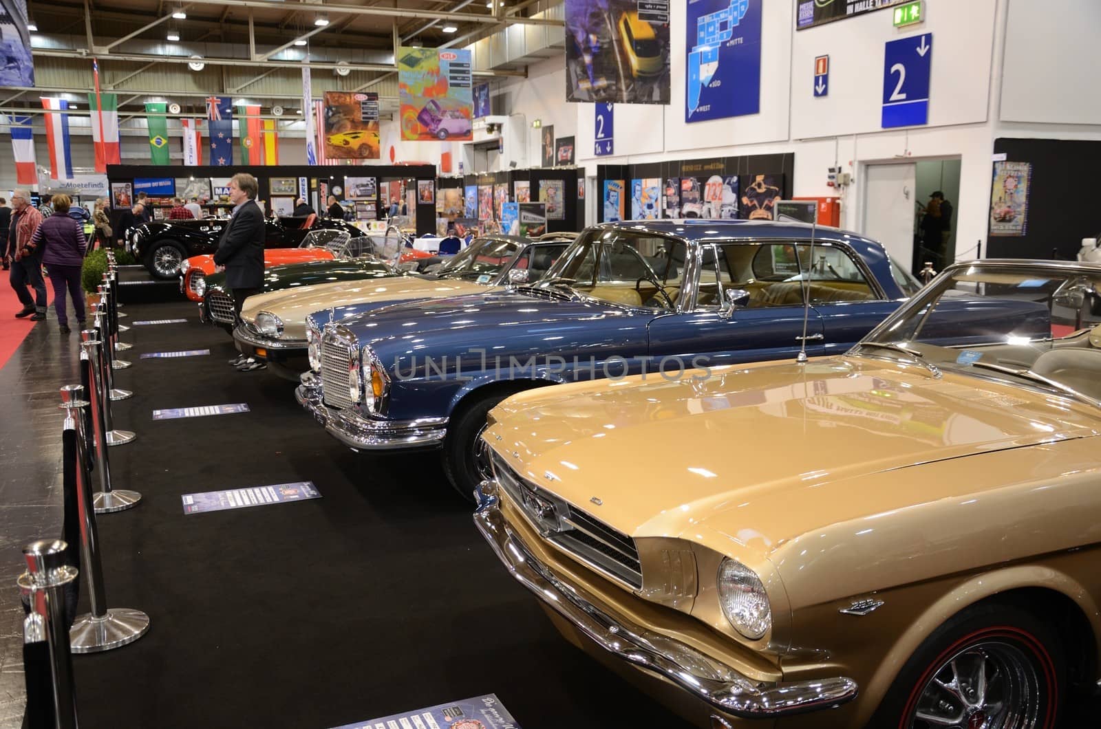 ESSEN, GERMANY - December 8: Ford Mustang and other classic cars presented during Essen Motor Show in Germany, on December 8, 2013.
