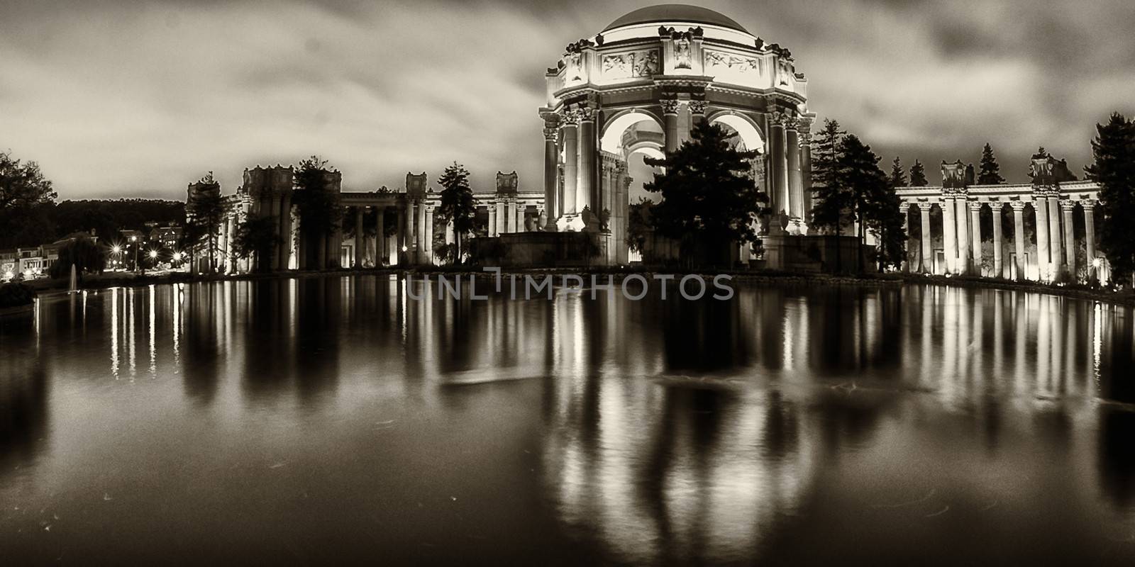 Reflection of a museum on water, Palace Of Fine Arts, Marina District, San Francisco, California, USA