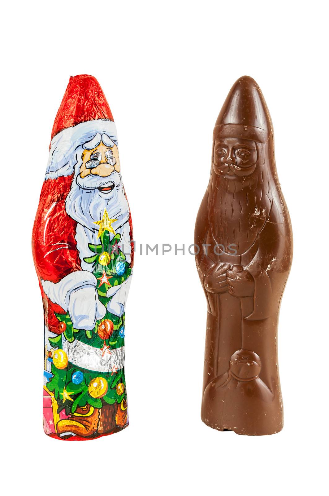 Chocolate figures of santa Claus isolated over white background with clipping path.
