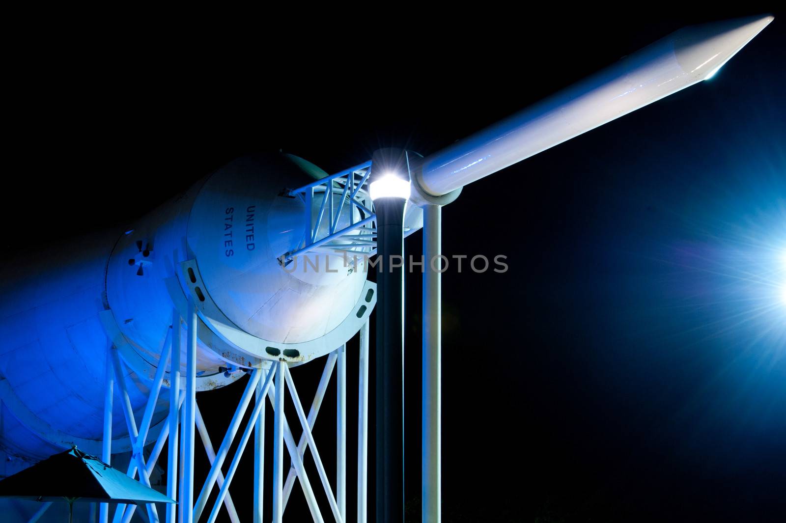 Rocket at the Kennedy Space Center illuminated by blue light. Cape Canaveral, Florida