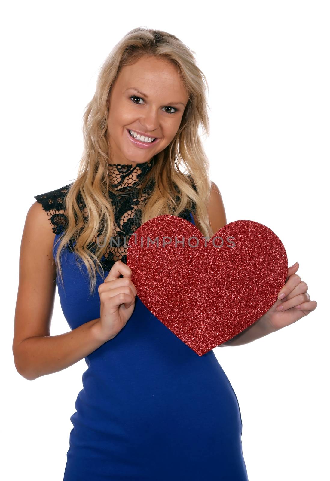 Lovely blond girl hold a shiny red heart for valentines day on isolated white