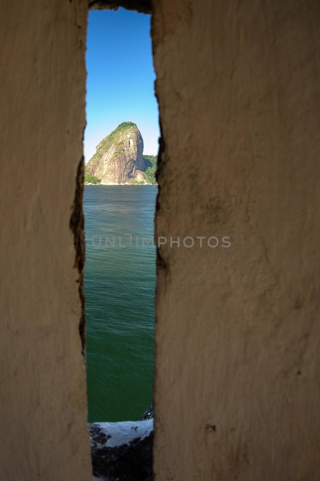 Sugarloaf Mountain viewed through a hole of wall, Guanabara Bay, Rio De Janeiro, Brazil