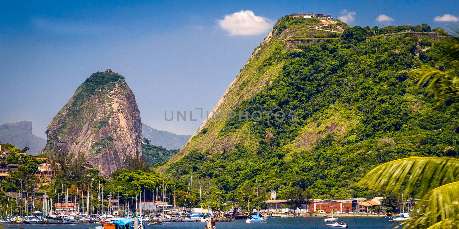 Boats at a harbor with Sugarloaf Mountain in the background, Guanabara Bay, Rio de Janeiro, Brazil