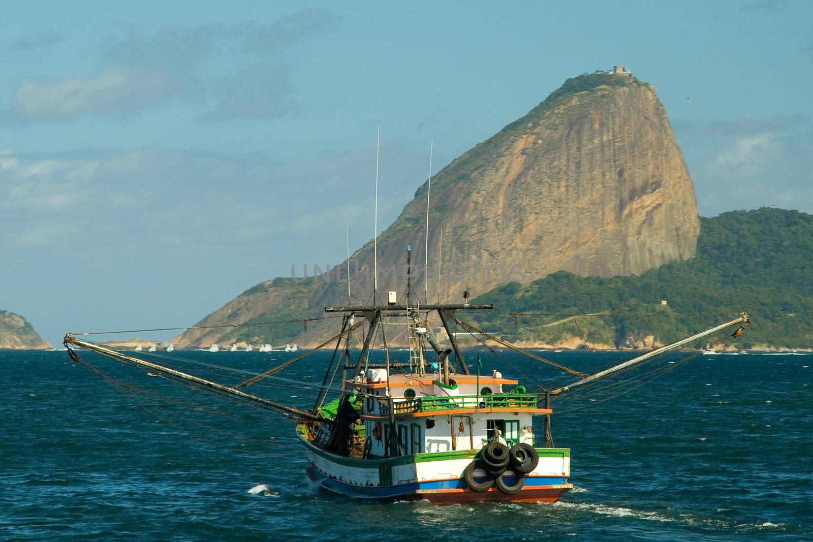 Boat in front of Sugarloaf Mountain in Rio De Janeiro, Brazil