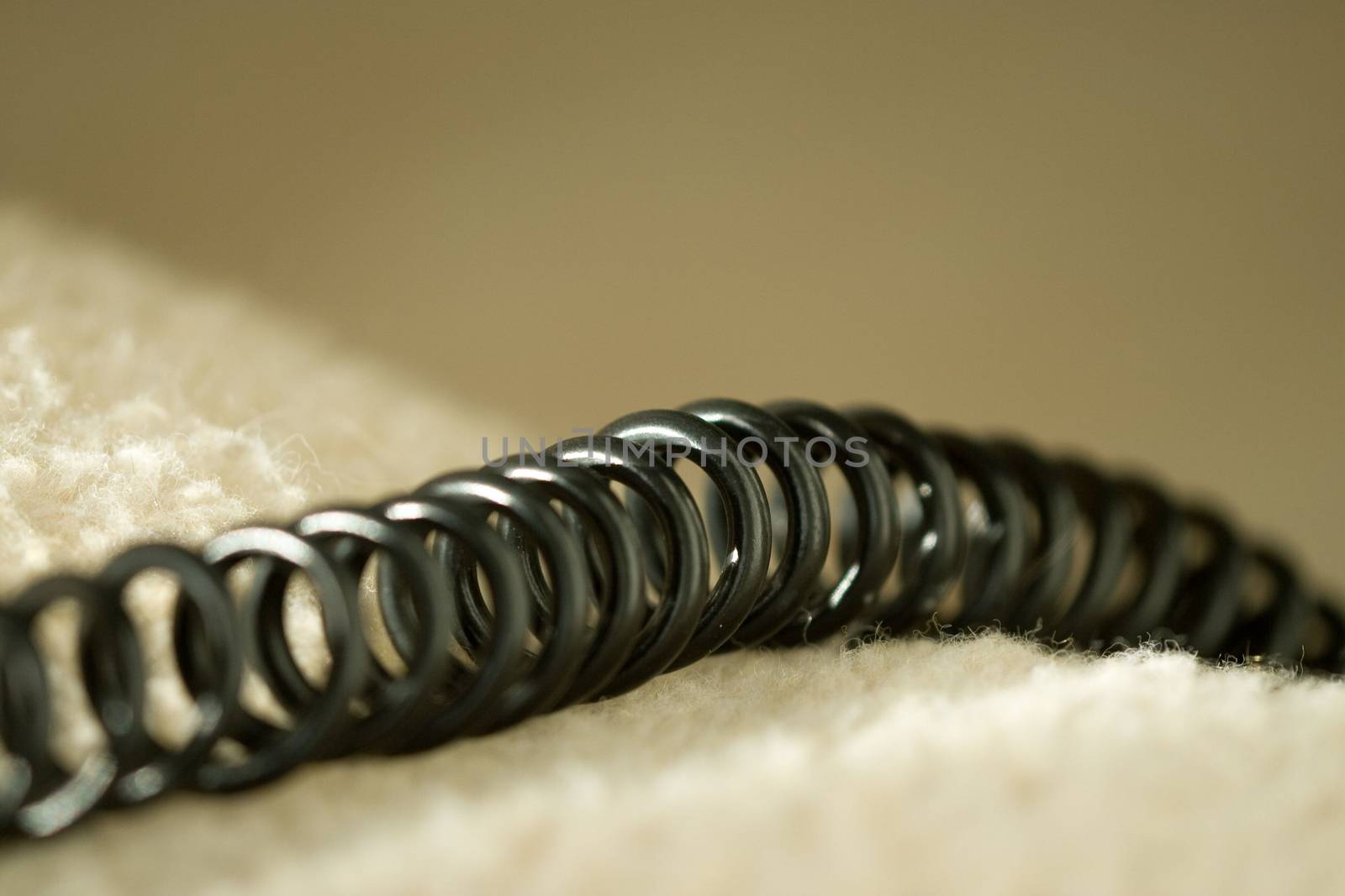 Close-up of a spiral telephone cord