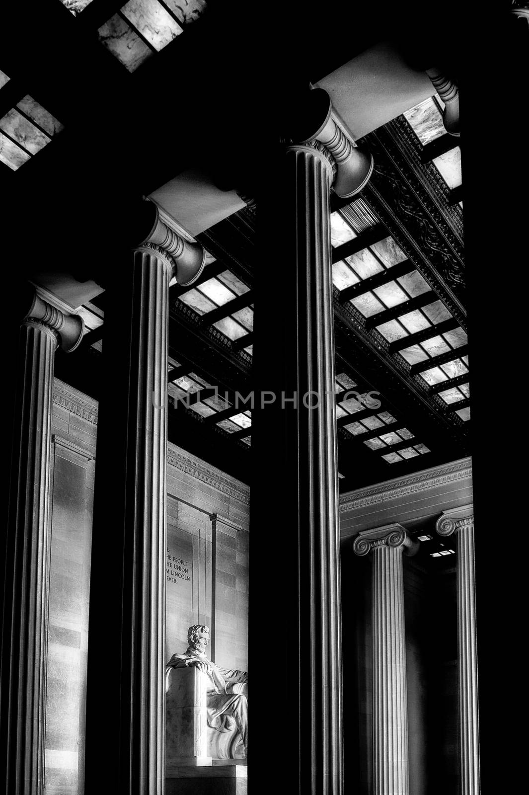 The interior of the Lincoln Memorial in Washington D.C., USA in black and white.