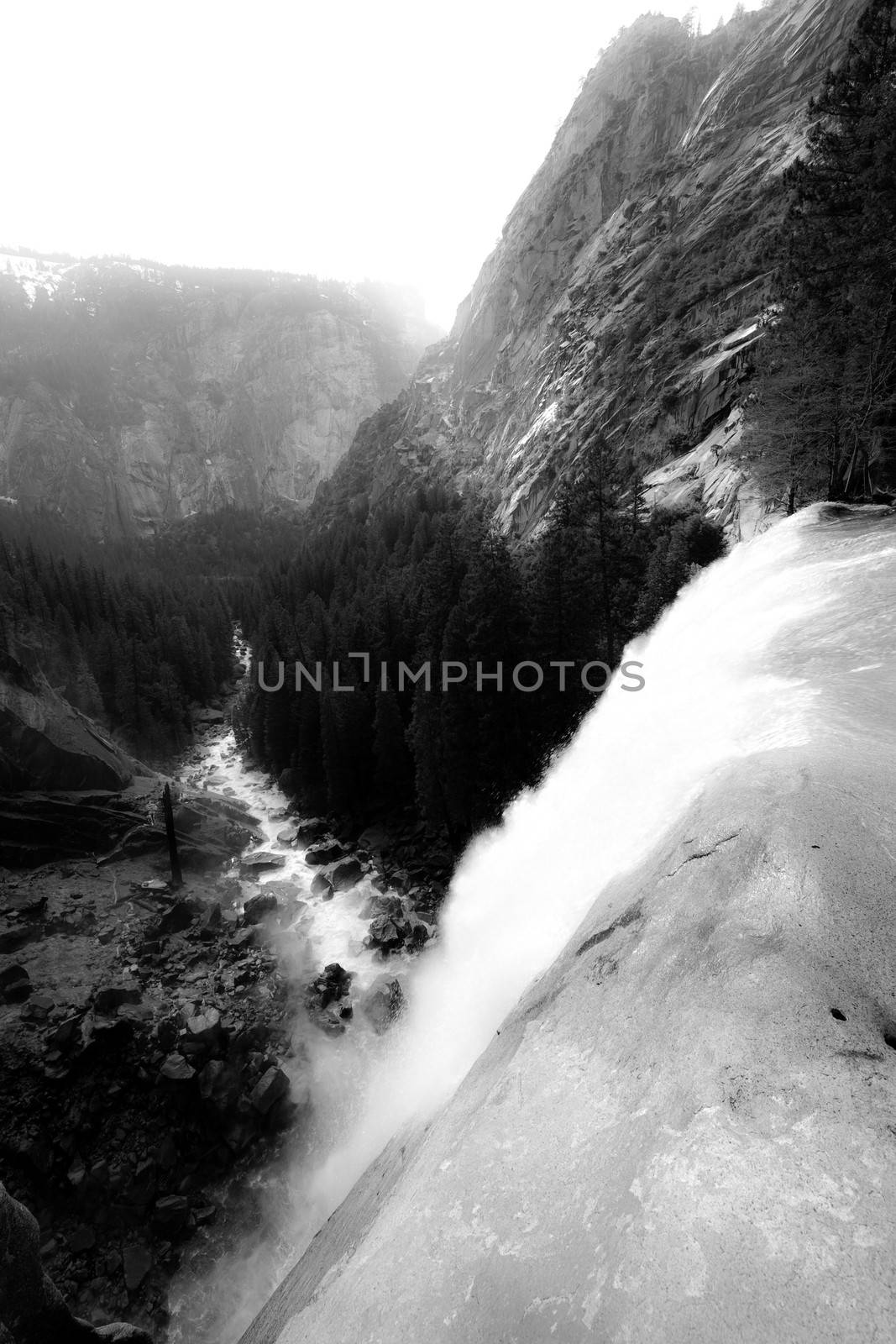 The Vernal Fall in Yosemite with cool vernal spray in contrast to the midday summer heat.