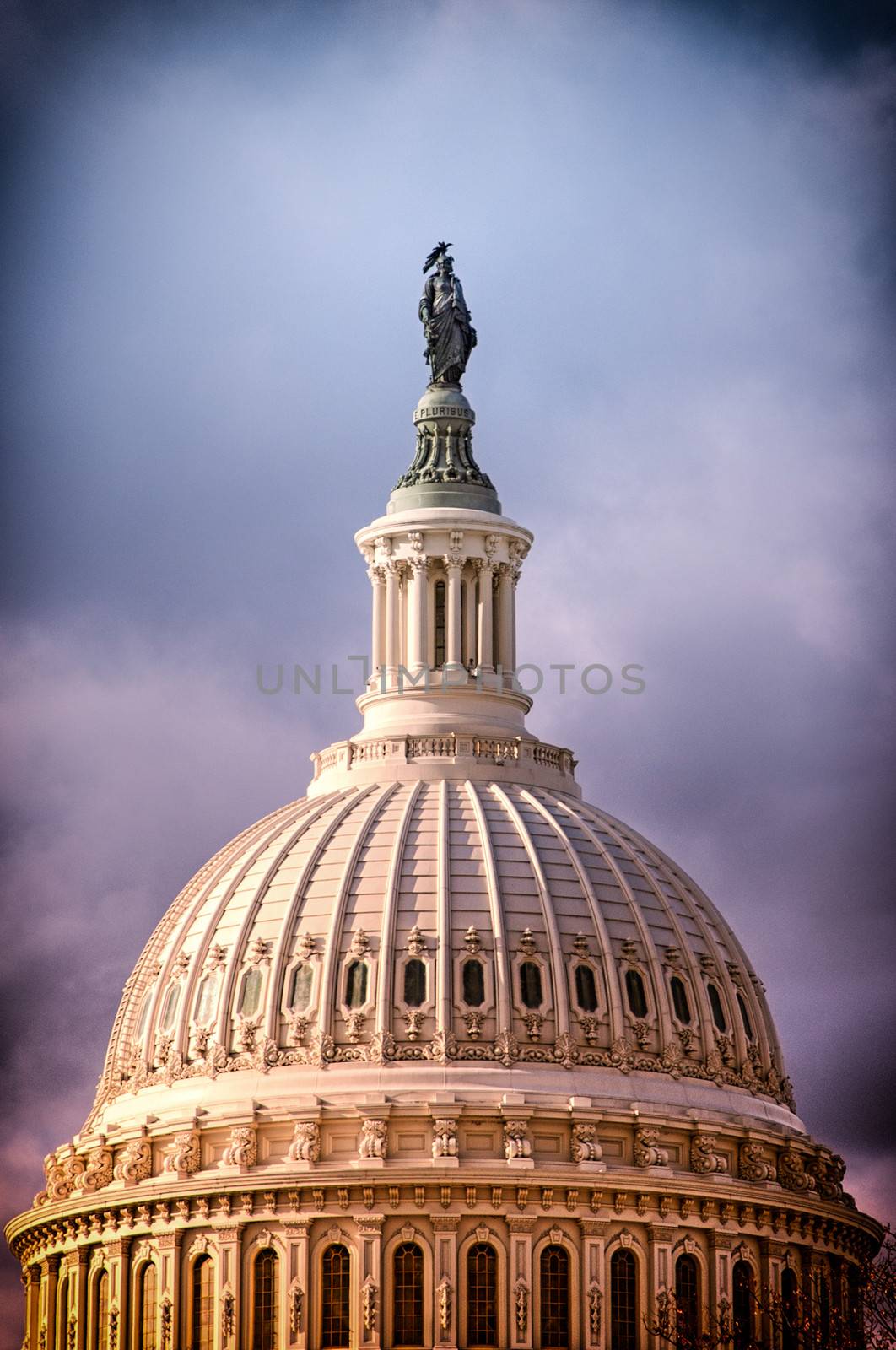 The United States Capitol dome withe the statue of Freedom on top in Washington, D.C.