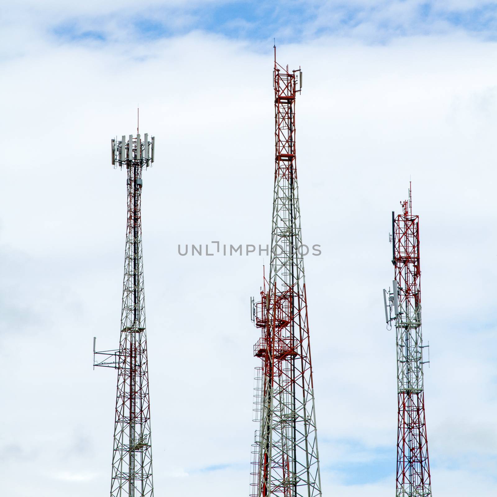 Communication tower over a blue sky background