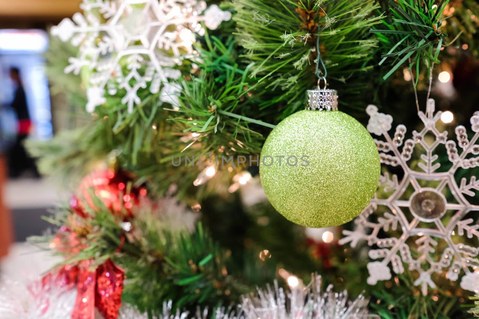 Christmas decorations on a tree by IVYPHOTOS