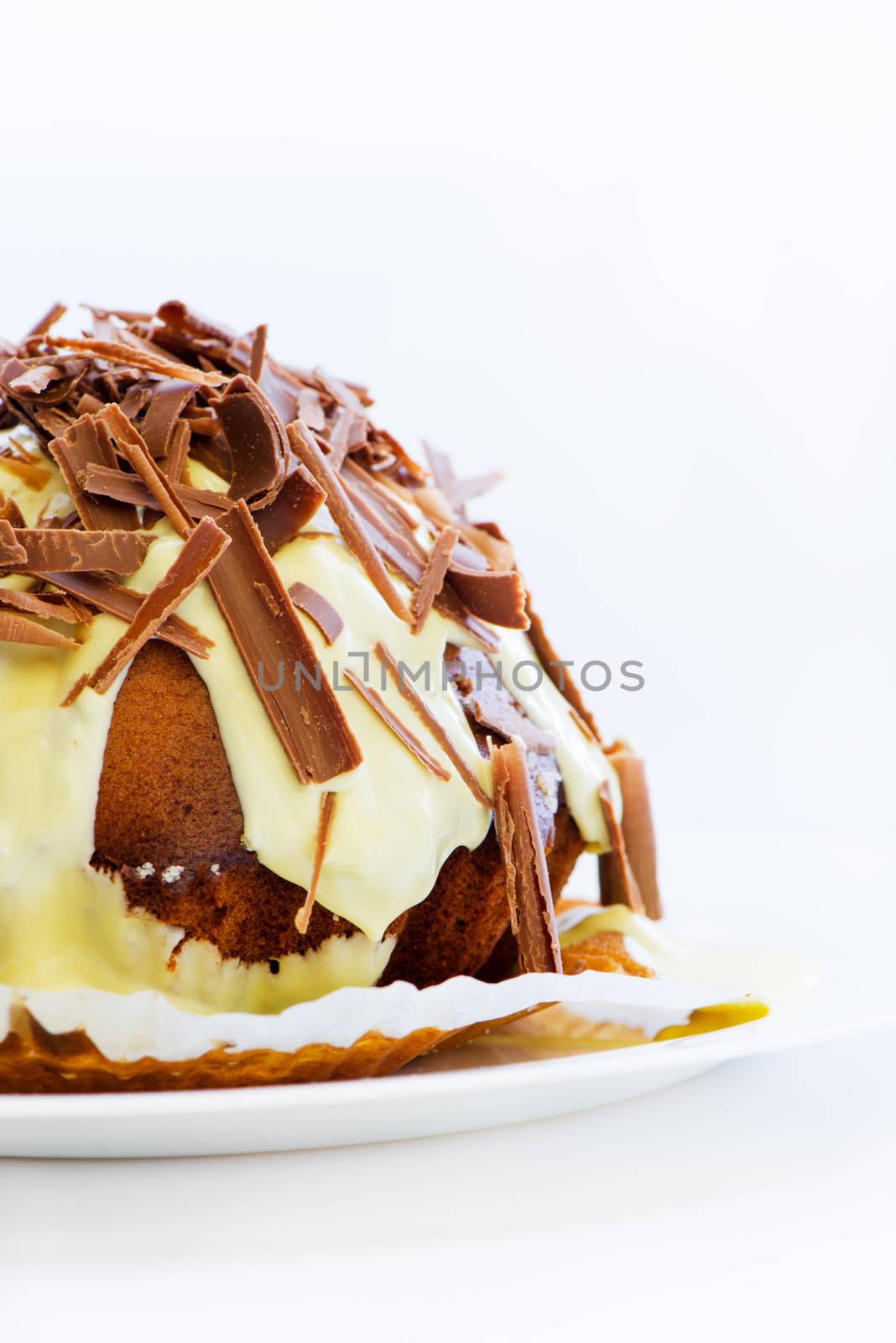 gugelhupf cake with chocolate sprinkles isolated on white background