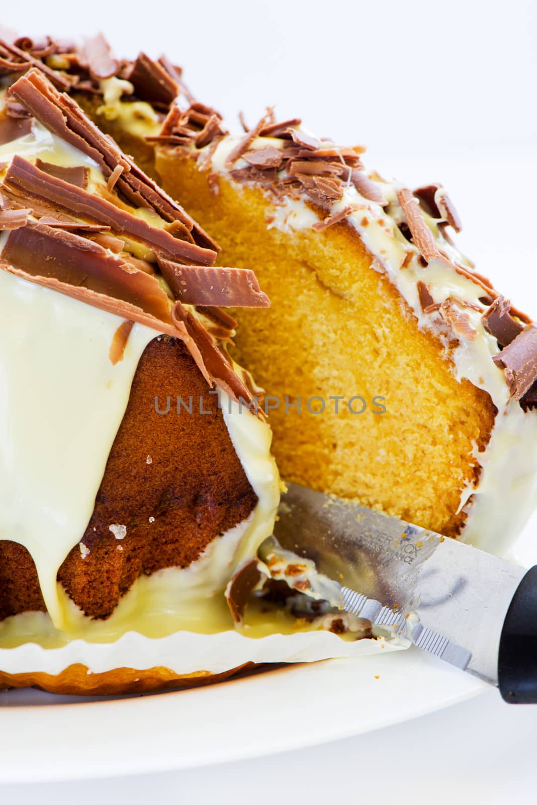 gugelhupf cake with chocolate sprinkles isolated on white background